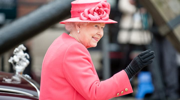 Queen Elizabeth II waving in Liverpool.