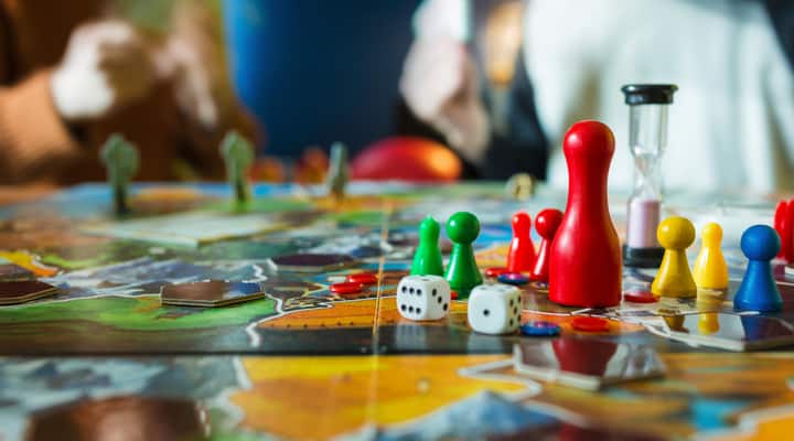 A close-up of a board game on a table.