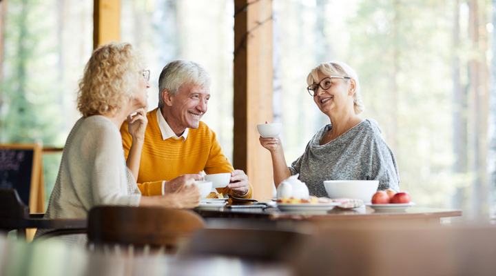 Group of friends talking over a cup of tea.