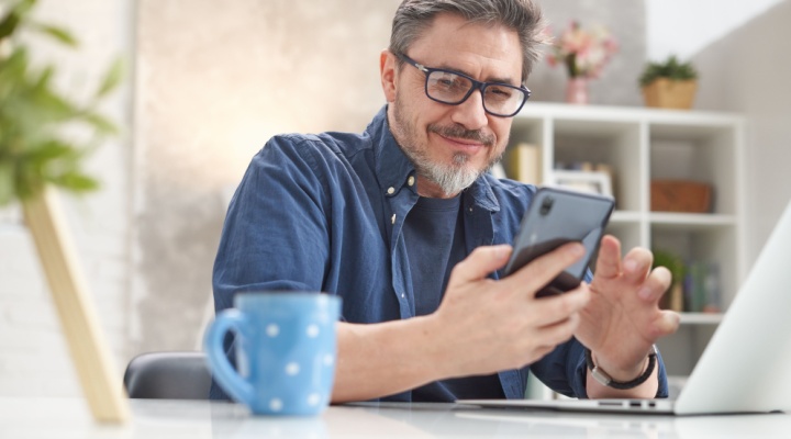 A man reading on his phone.