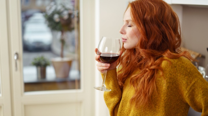 Woman enjoying a glass of wine