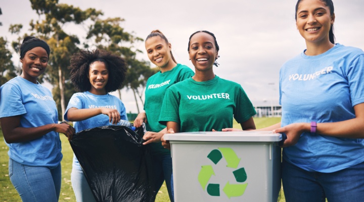 A group of women volunteering outside.