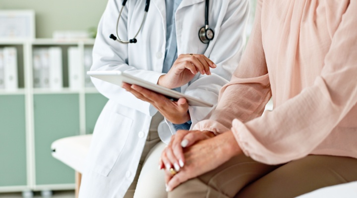 A doctor talking to a patient.